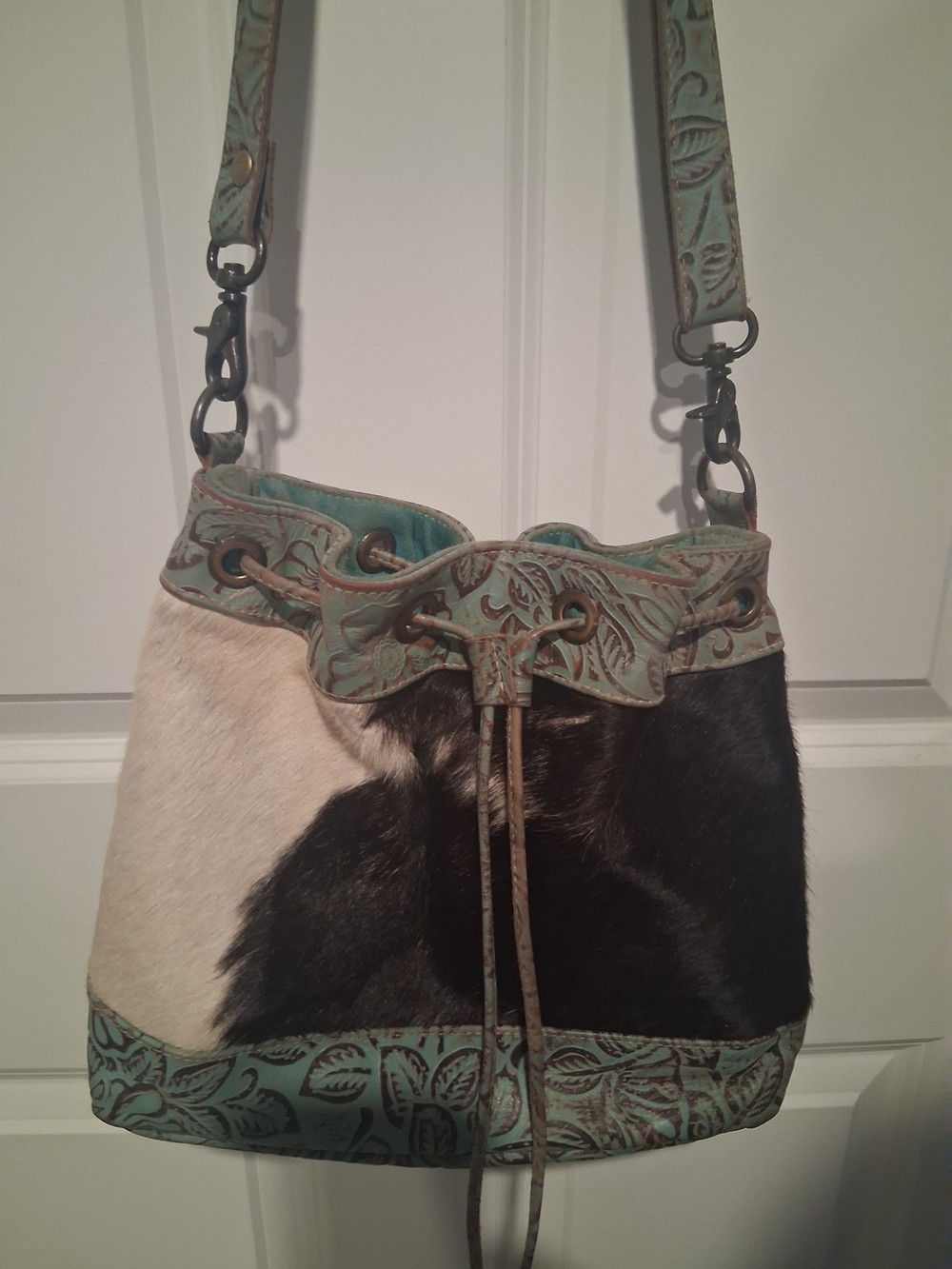 Myra BAG Two-Tone Haircalf Drawstring Bucket Bag in Teal and Black